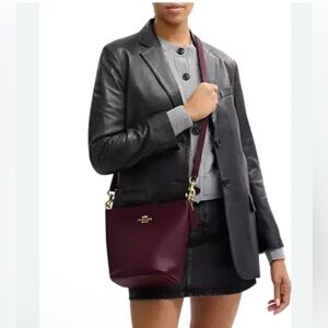 Coach Logan Duffle Bag. New no tag color wine